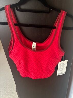 Lululemon NWT Textured Mesh Tennis Tank
Lululemon Red 
Size Medium
Retail $68.00